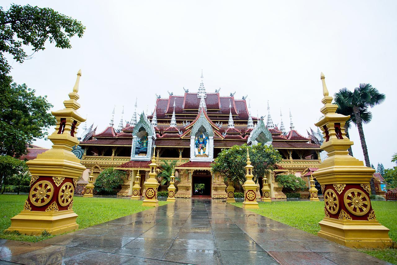 Dai-Yue Style Holiday Hotel Jinghong Exterior photo